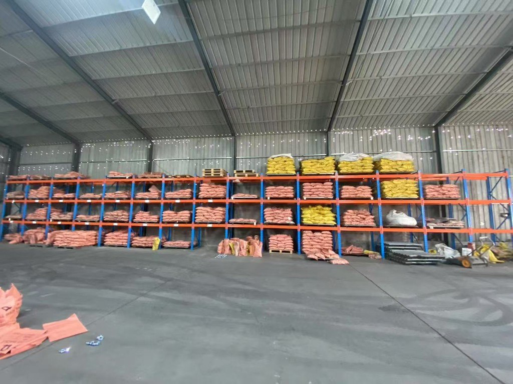 Production floor warehouse racking with stored materials